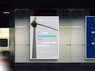 Two posters displayed on a wall