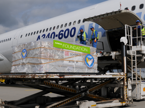 Airbus Foundation sticker on packages in front an A340